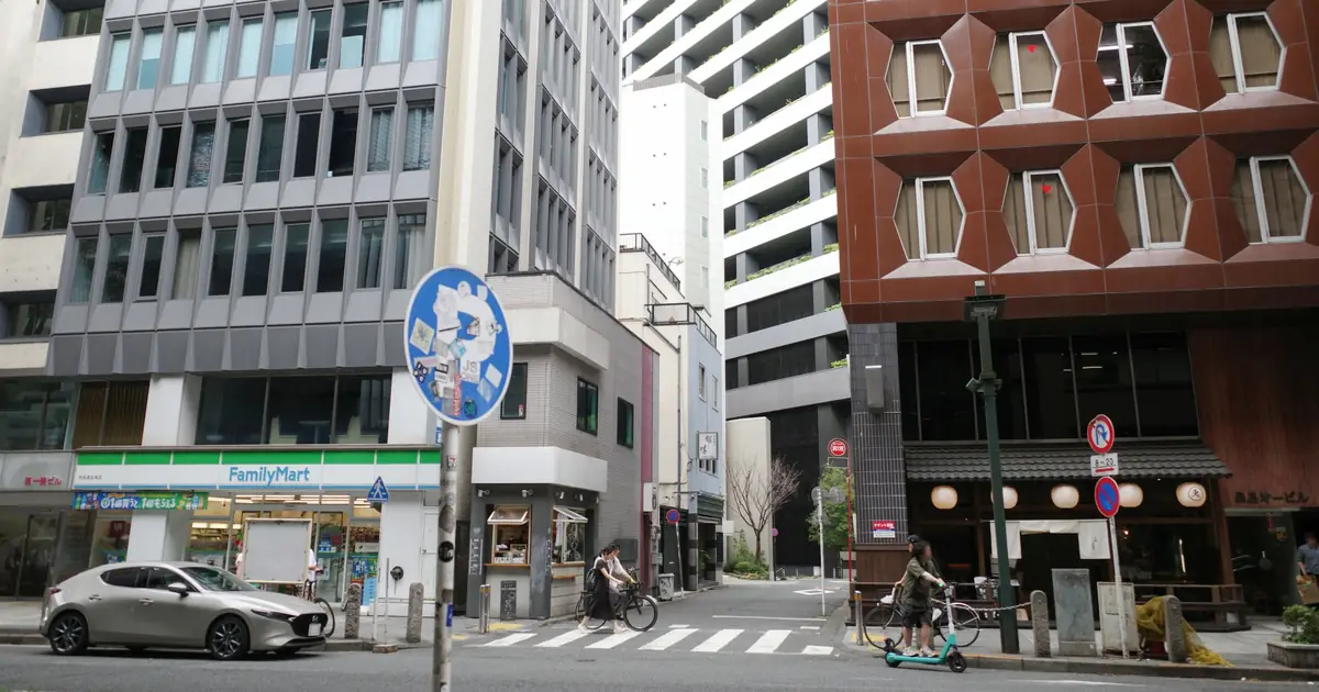 A FamilyMart convenience store on a Japanese city street corner
